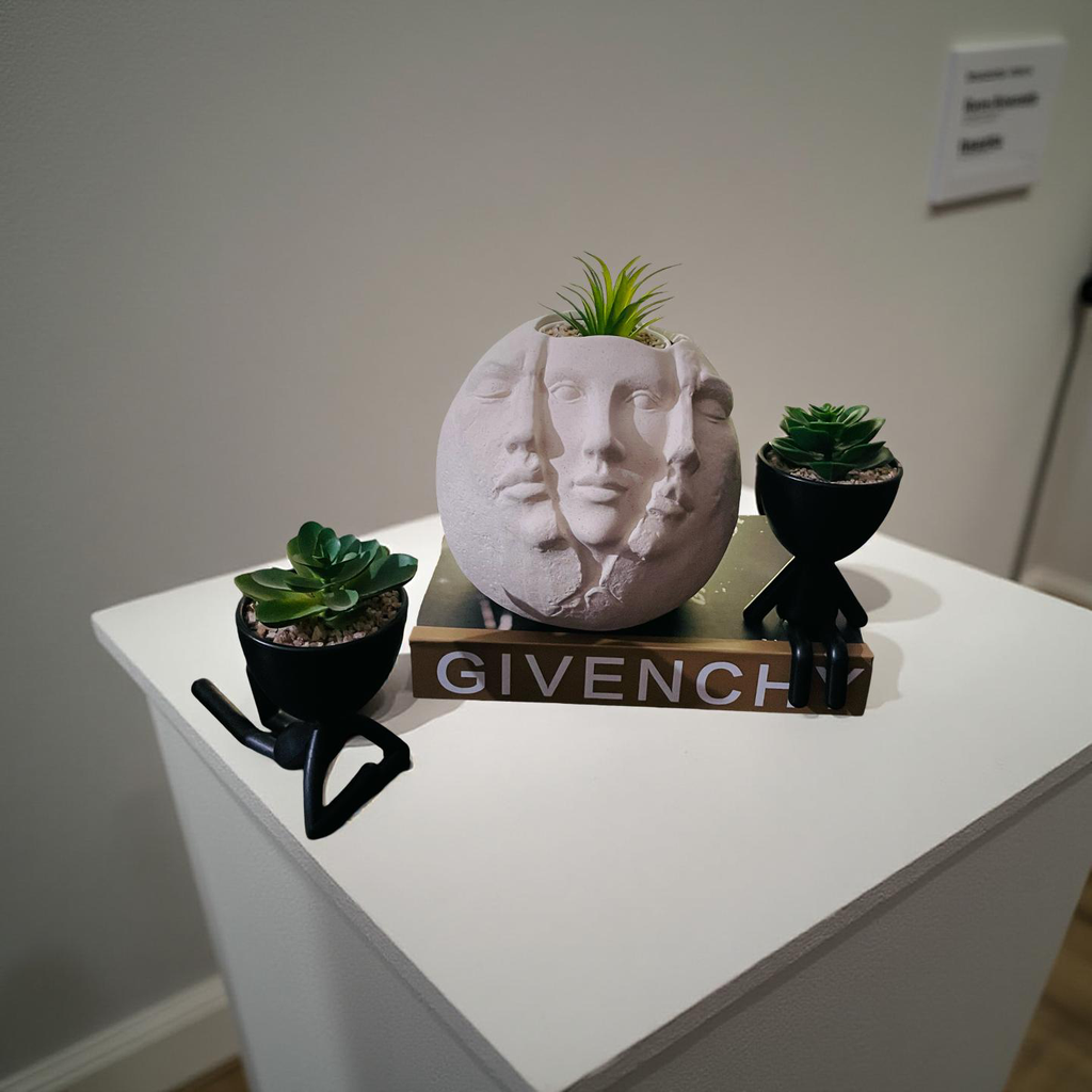 Trinity Faces Planter